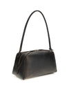 le bouledogue shoulder bag in aged leather