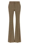 saint laurent flared trousers redefine classic tailoring through a silhouette in
