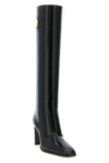 saint laurent louis high boots embody a rigorous and structured elegance