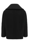 the balenciaga black short caban redefines classic proportions through a rigorou