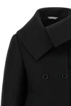 the balenciaga black short caban redefines classic proportions through a rigorou