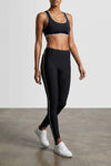 moschinos black leggings define the silhouette through a stretch lycra construc