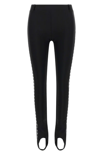 moschinos black leggings define the silhouette through a stretch lycra construc