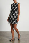 moschinos mini dress redefines the trapezoid silhouette through a sartorial con