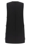 moschinos mini dress redefines the trapezoid silhouette through a sartorial con