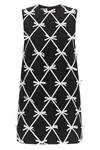 moschinos mini dress redefines the trapezoid silhouette through a sartorial con