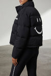 the moschino x smiley bomber jacket redefines the volumes of outerwear through a
