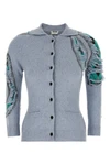 the moschino distressed argyle cardigan in mélange blue redefines classic knit