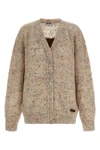 the moschino cardigan redefines contemporary knitwear through a sophisticated bo