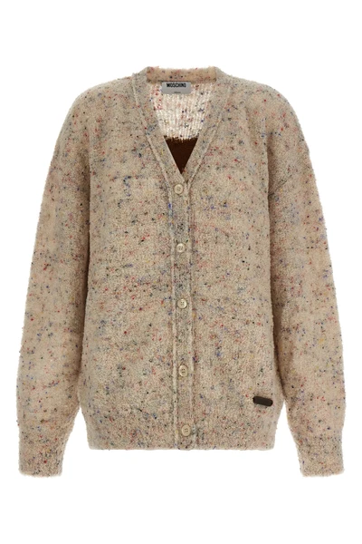 the moschino cardigan redefines contemporary knitwear through a sophisticated bo