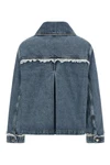 the denim jacket ganni redefines the codes of casual dress through a structured