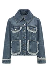 the denim jacket ganni redefines the codes of casual dress through a structured