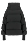the black ganni down jacket is distinguished by a voluminous silhouette and asym