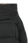 the black ganni down jacket is distinguished by a voluminous silhouette and asym