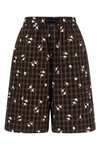 gannis check flower bermuda shorts present a masterful balance between sartor