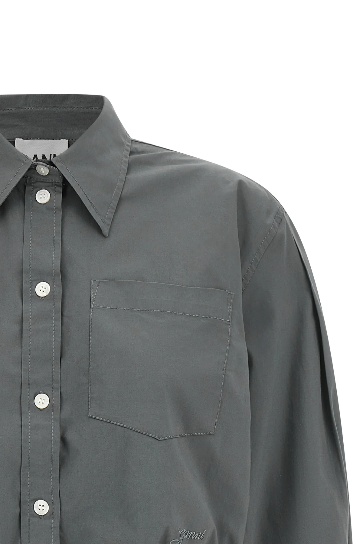 the ganni cropped shirt reinterprets the classic silhouette through shortened pr