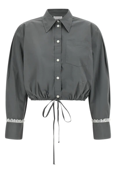 the ganni cropped shirt reinterprets the classic silhouette through shortened pr