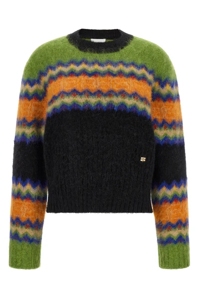 the ganni sweater redefines traditional knitwear through a bold play of color co