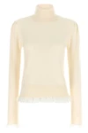 the turtleneck knit ganni defines a new interpretation of essential knitwear thr