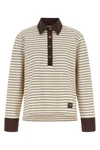 the long-sleeved polo shirt ganni redefines casual dress codes through meticulou