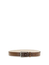 carved leather belt with shimmering buckle