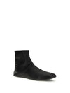 leather ankle boots lined with soft shearling