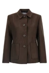 the misenithe scarlett blazer redefines the codes of outerwear through an esse