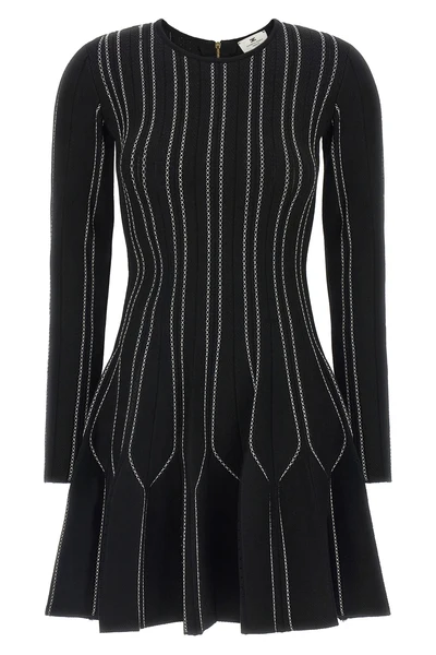 elisabetta franchi mini dress defines the silhouette through a rigorous sartoria