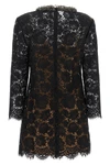 the self-portrait mini dress is built through a complex black floral lace workma