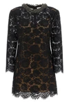 the self-portrait mini dress is built through a complex black floral lace workma