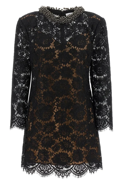the self-portrait mini dress is built through a complex black floral lace workma