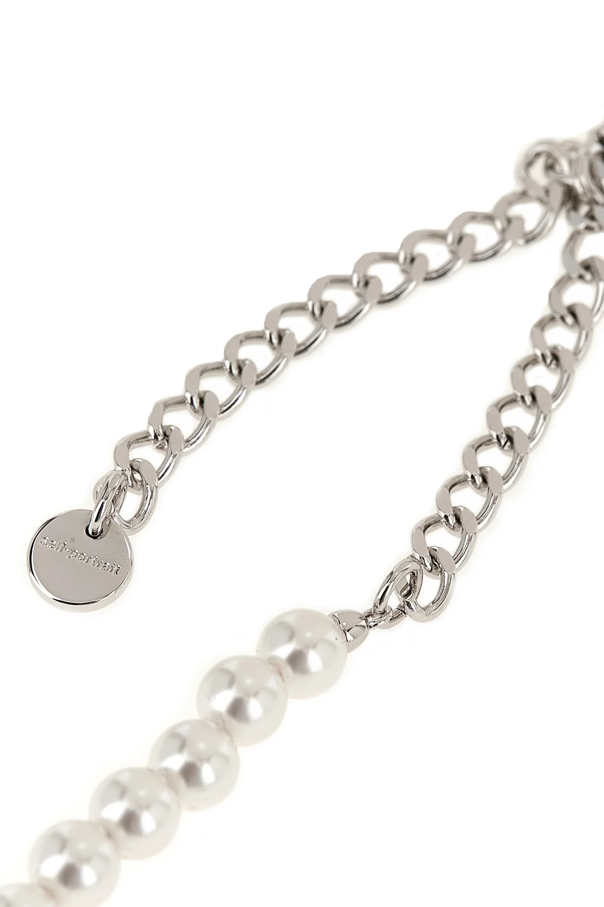 the black bow pearl necklace by self-portrait is structured on a continuous th