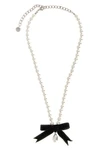 the black bow pearl necklace by self-portrait is structured on a continuous th