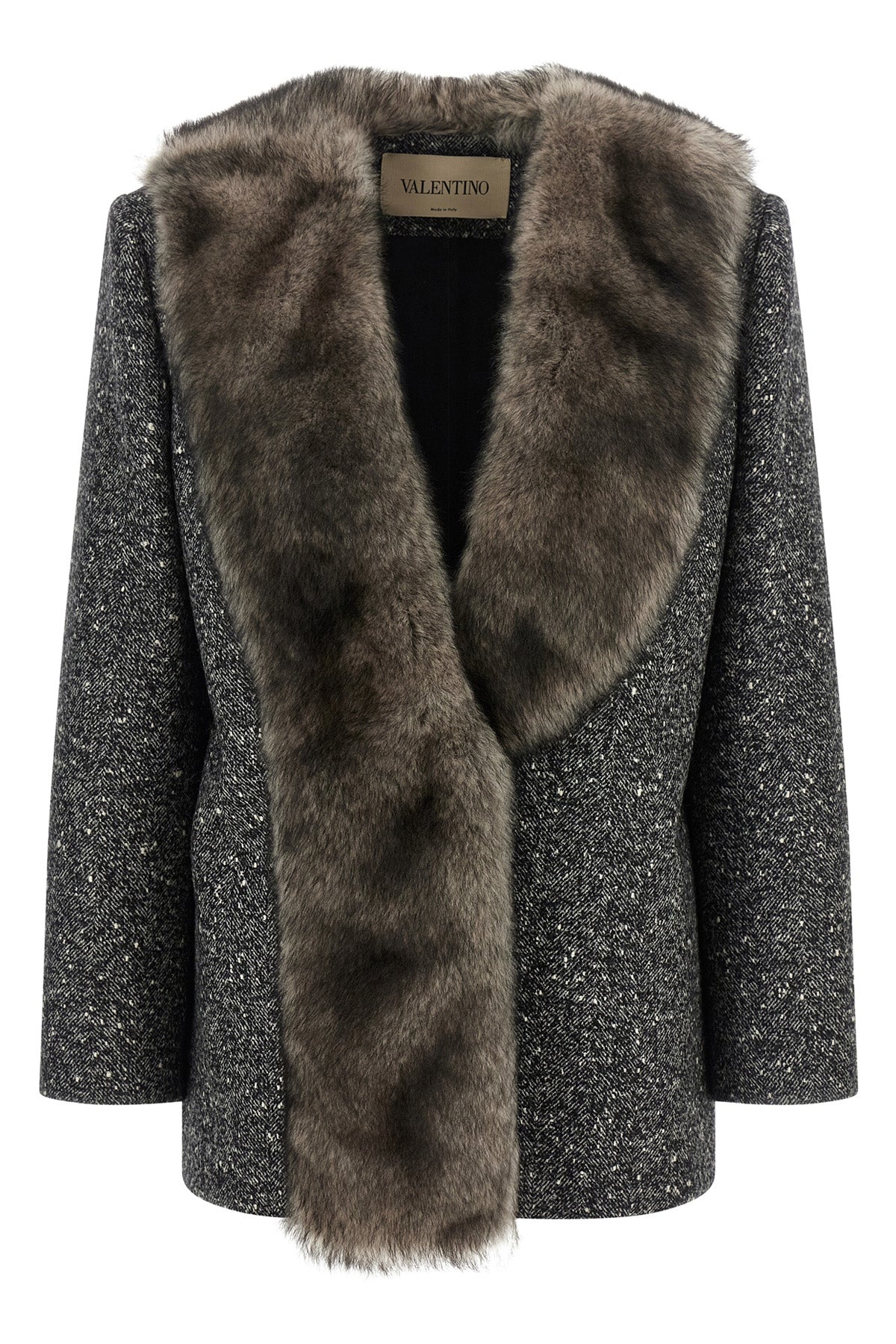 the valentino garavani mossi caban redefines the codes of outerwear through an