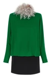 the valentino garavani mini dress defines a sophisticated silhouette through a p