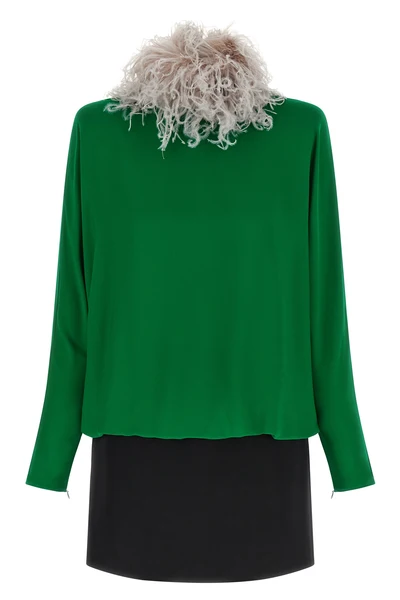 the valentino garavani mini dress defines a sophisticated silhouette through a p