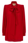 the valentino garavani bow shirt features a fluid tailored silhouette