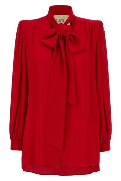 the valentino garavani bow shirt features a fluid tailored silhouette