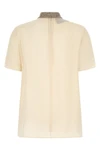 the valentino garavani short-sleeved top is made of fine crêpe de chine silk