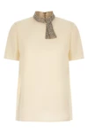 the valentino garavani short-sleeved top is made of fine crêpe de chine silk