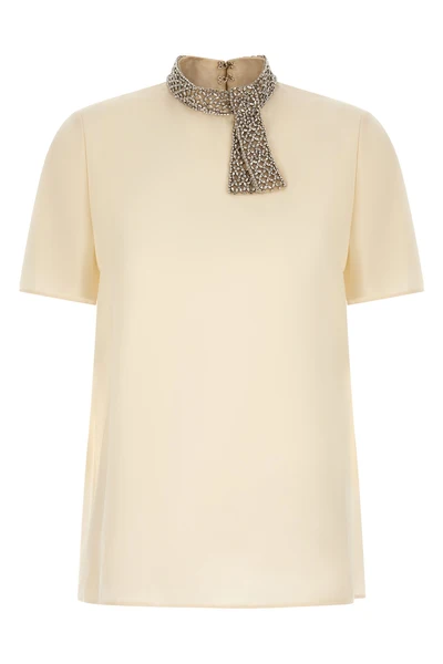 the valentino garavani short-sleeved top is made of fine crêpe de chine silk