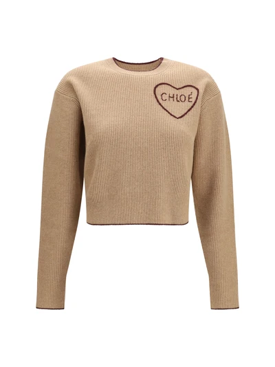 heart-logo sweater