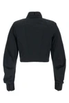 the elisabetta franchi cropped shirt redefines the codes of tailoring through a