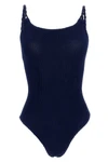 the hunza g camille one-piece swimsuit redefines beachwear through an innovative