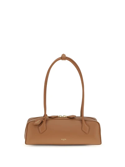 small le teckel shoulder bag