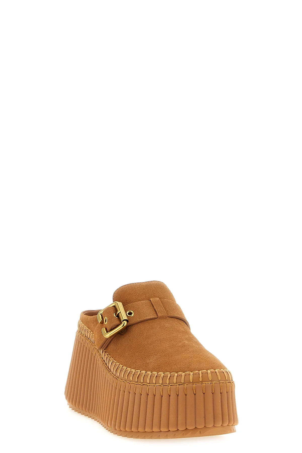 CHLOÉ 36 nama chloe sabots redefine the volumes of contemporary footwear through a slip-o