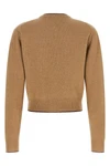 the chloé cardigan defines a tight and shortened silhouette through a fine proce