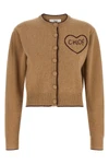 the chloé cardigan defines a tight and shortened silhouette through a fine proce