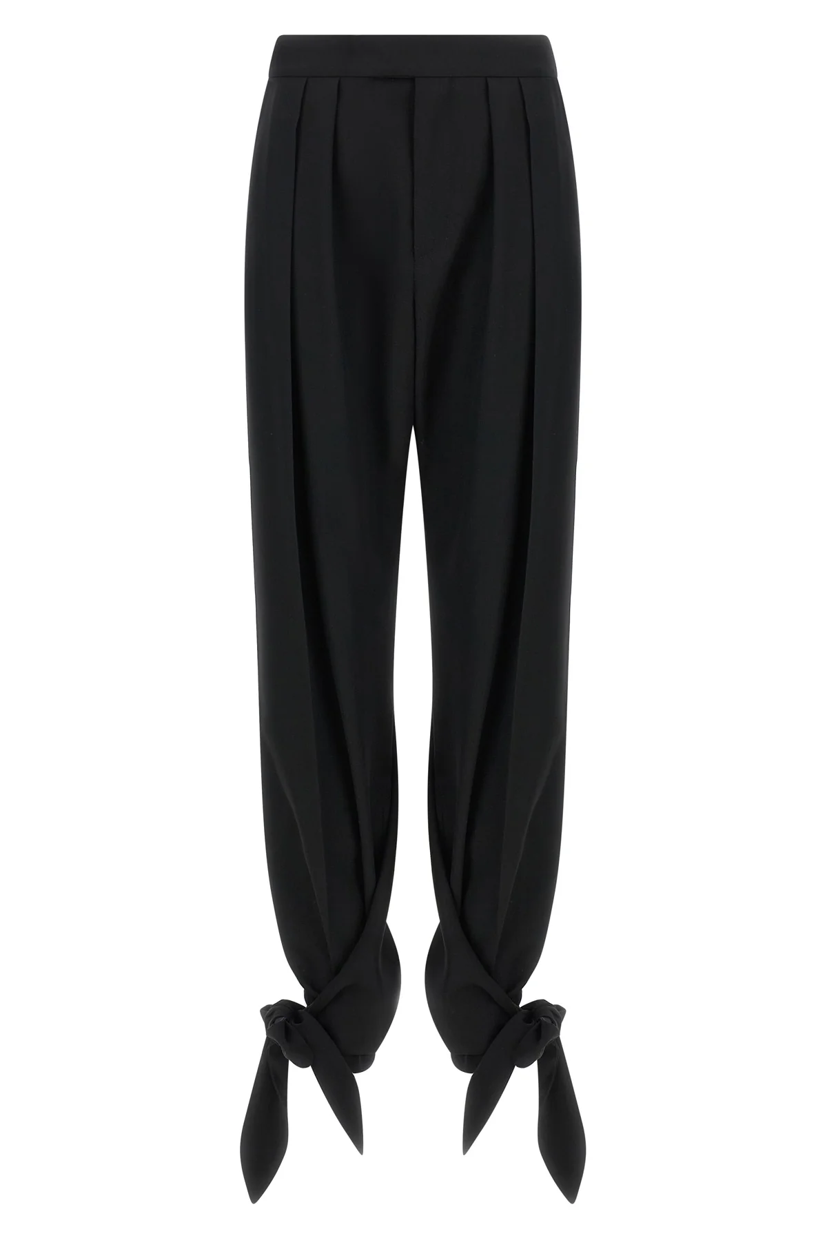 chloé trousers redefine contemporary tailoring through fluid volumes and unexpec