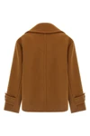 the chloé short coat redefines the codes of outerwear through a boxy silhouette